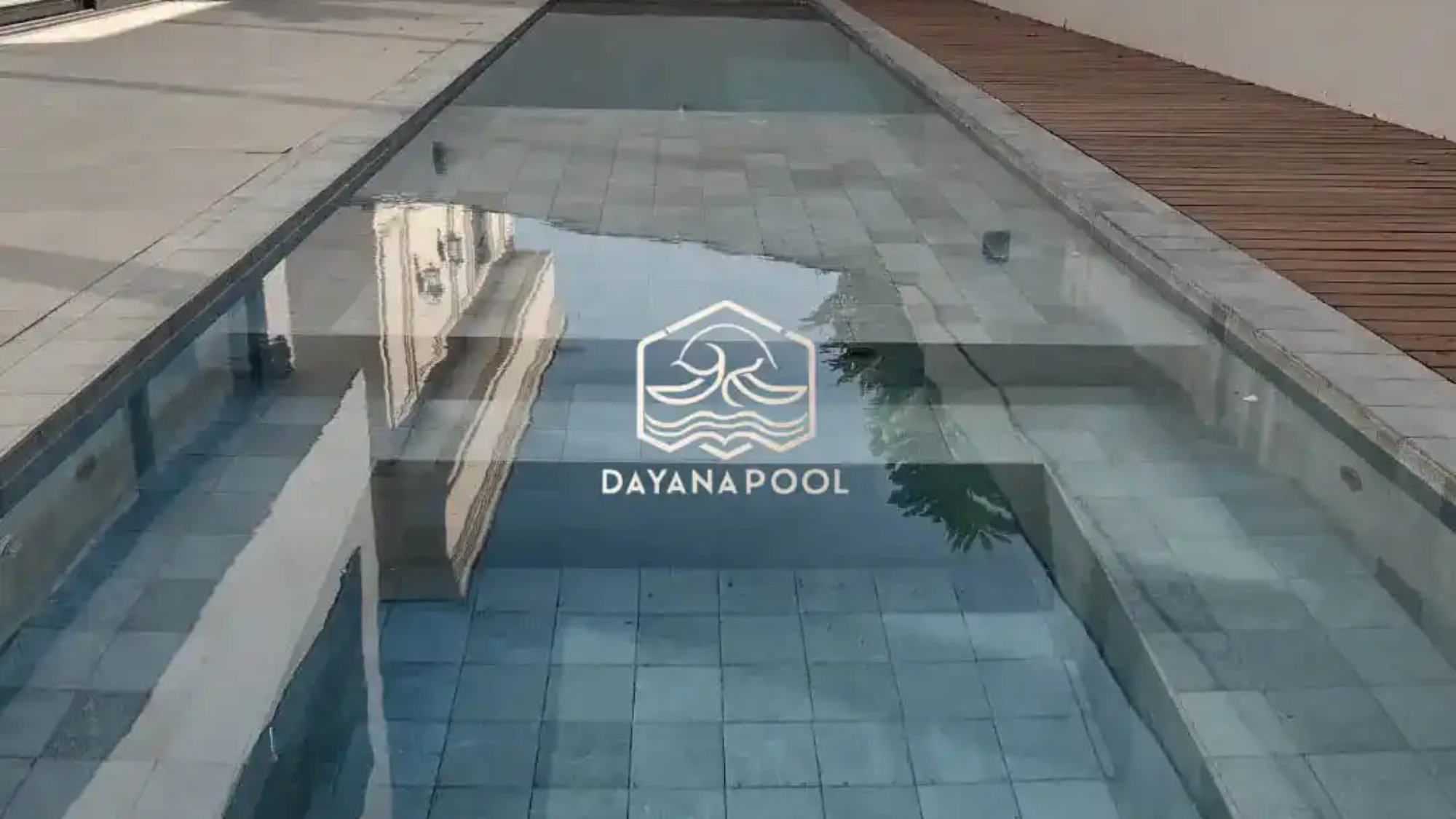 kolam renang denagan finishing batu buatan dayanapool