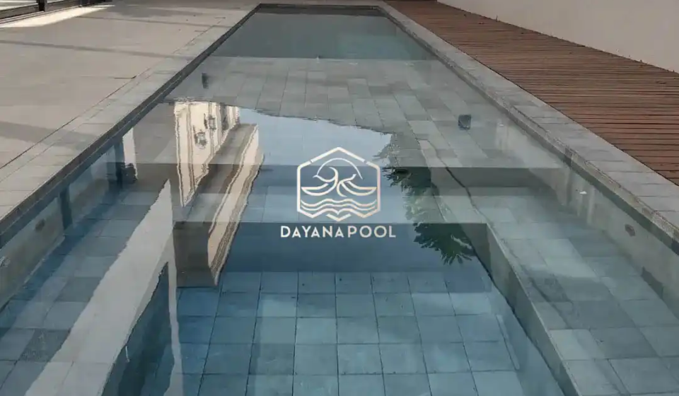 kolam renang denagan finishing batu buatan dayanapool