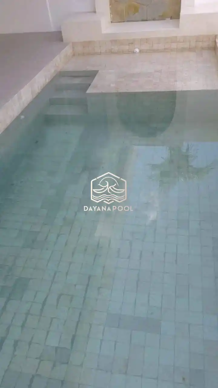kolam renang finishing batu alam