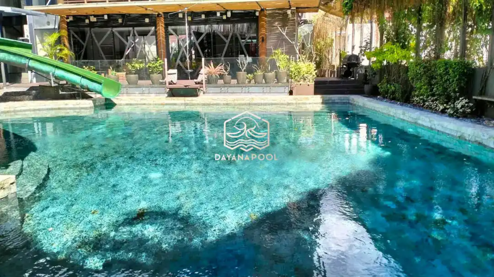 kolam renang denagn finishing batu alam buatan dayanapool