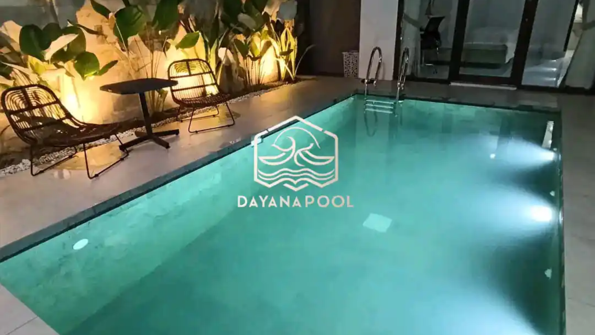 kolam renang denagn finishing batu alam buatan dayanapool