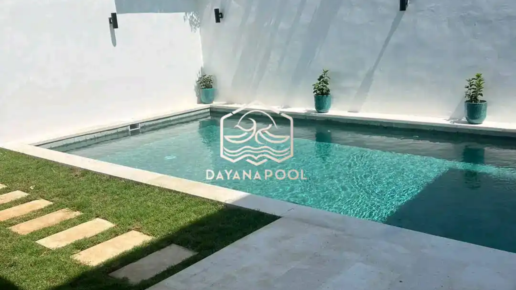 kolam renang denagn finishing batu alam buatan dayanapool