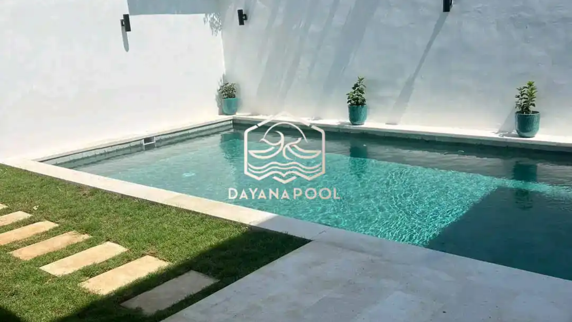 kolam renang denagn finishing batu alam buatan dayanapool
