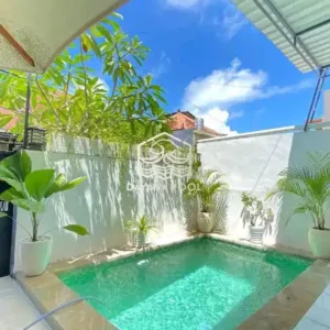 kolam renang denagn finishing batu alam buatan dayanapool