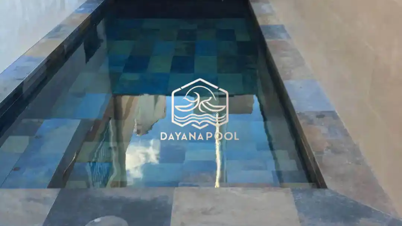 kolam renang denagn finishing batu alam buatan dayanapool