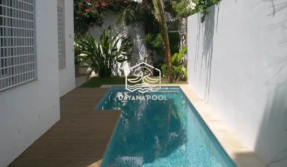 kolam renang denagn finishing batu alam buatan dayanapool