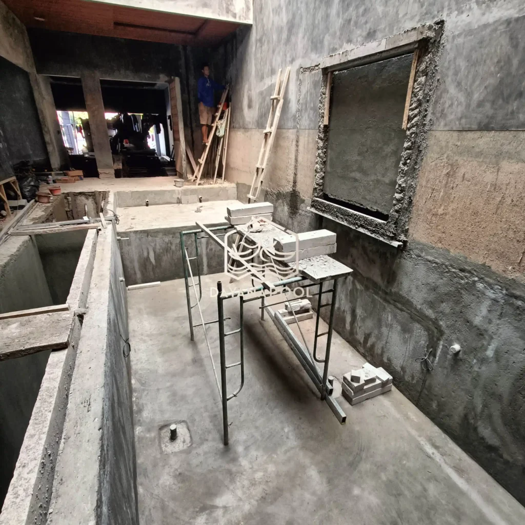 proses pemelesteran kolam renang