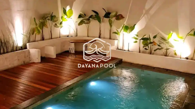 kolam renang minimalis denagn finishing batu alam sukabumi