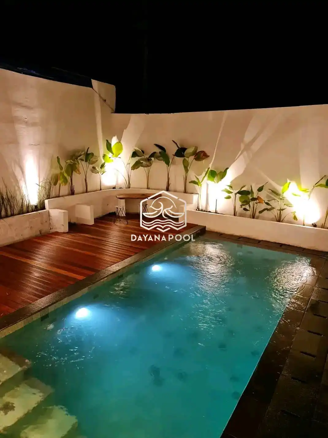 kolam renang minimalis denagn finishing batu alam sukabumi
