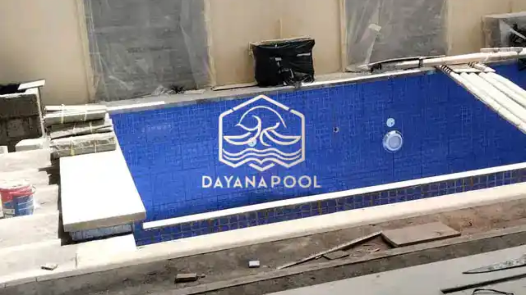 proses pengenatan kolam renang