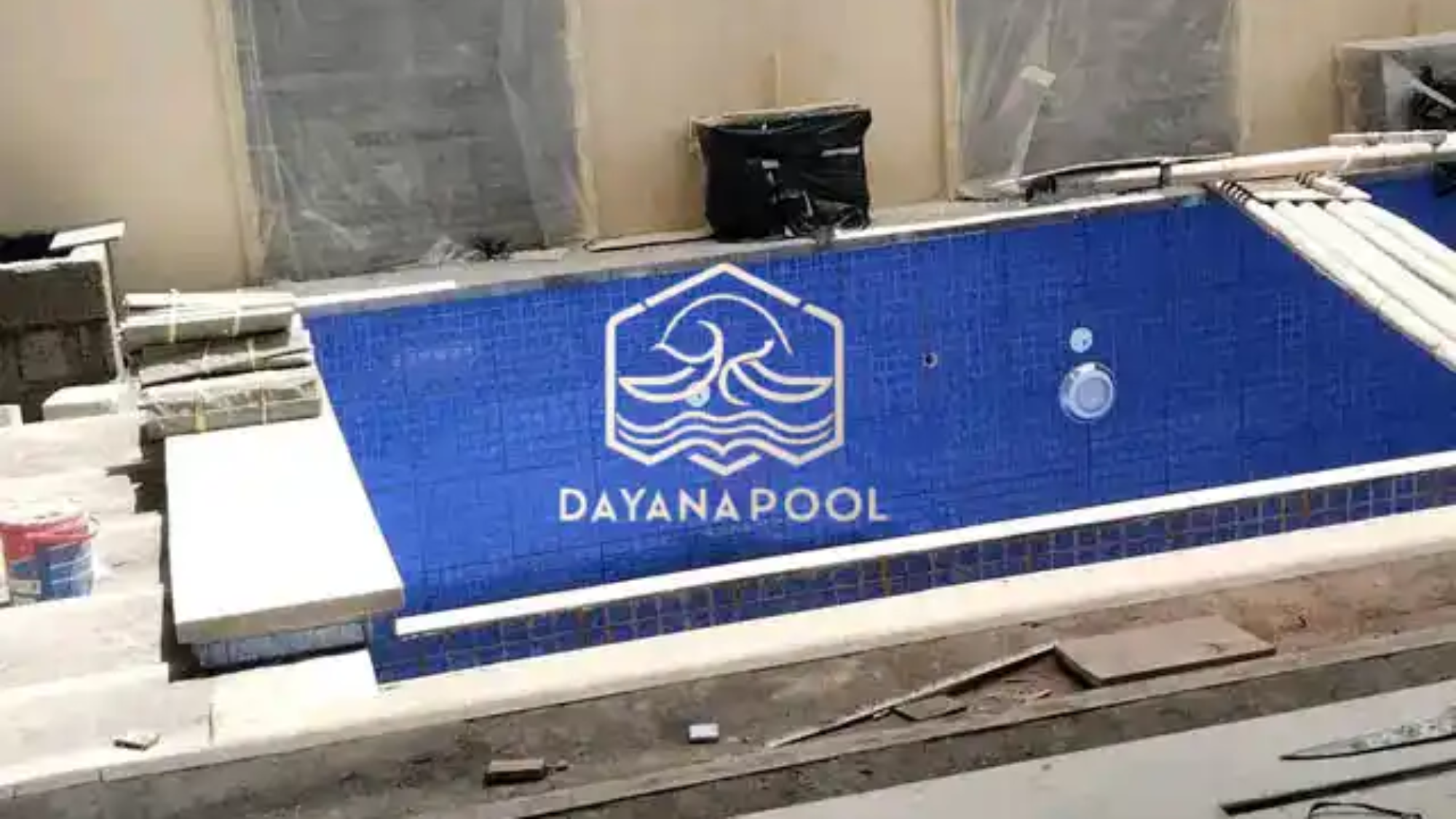 proses pengenatan kolam renang