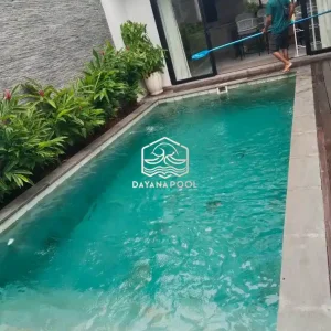 kolam renang finishing batu alam