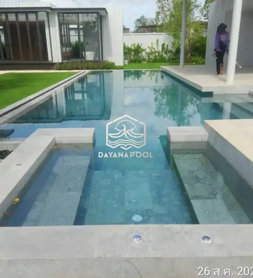 kolam renang desain mewah dengan finishing batu