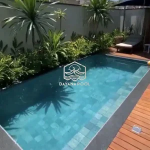 kolam renang minimalis denagn finishing batu alam sukabumi