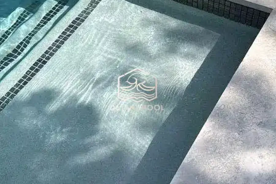 kolam renang minimalis denagn finishing batu alam sukabumi
