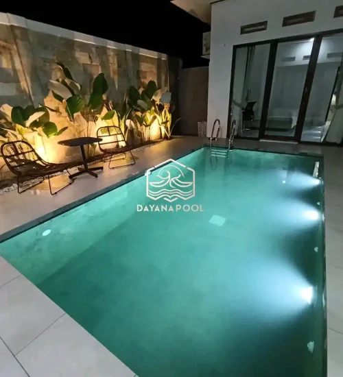 kolam renang denagn finishing batu alam buatan dayanapool