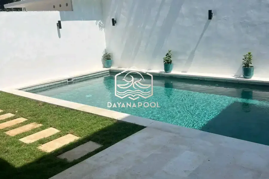 kolam renang denagn finishing batu alam buatan dayanapool