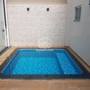 kakuzzi minimalis di dalam rumah dengan mozaik biru
