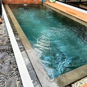 kolam renang dengan finishing batu andesit