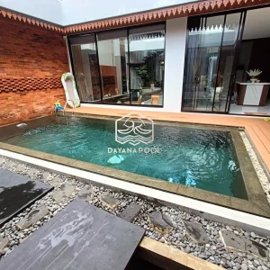 kolam renang dengan finishing batu andesit
