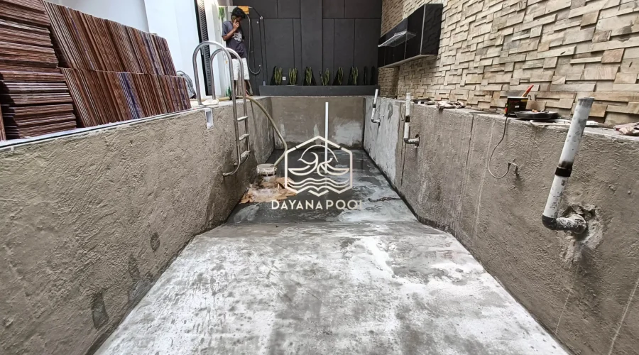 perbaikan kolam renang